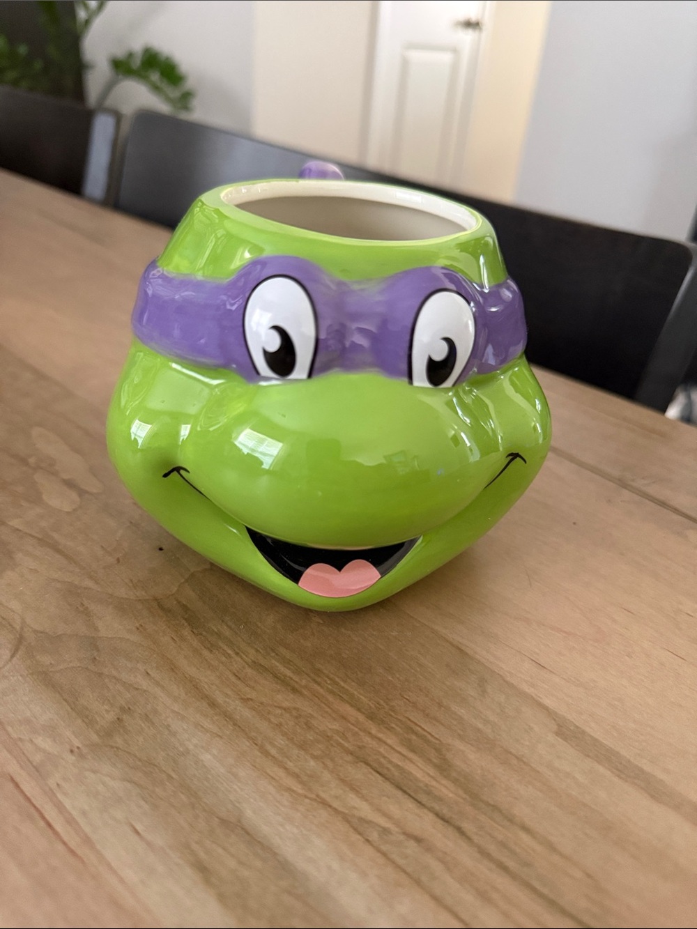 Green Ceramic Character Mug with Purple Mask